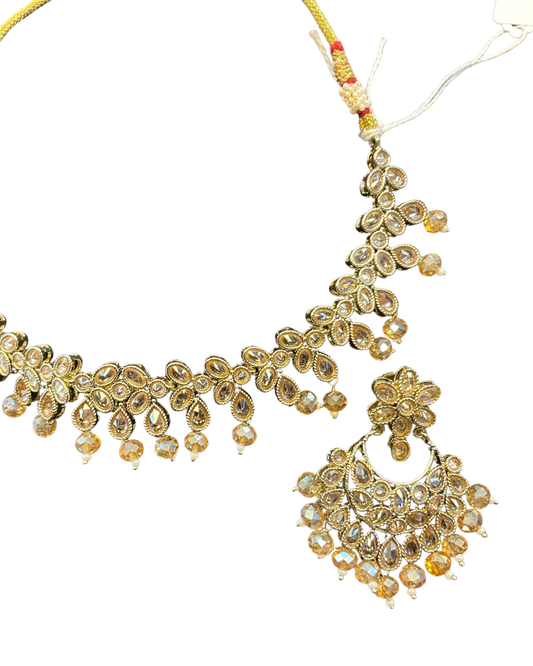Crystal / Neutral - Medium Size Antique Gold Finish Necklace Set with Earrings & Head Piece - KAJ1016 03KK26