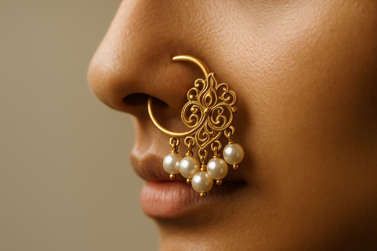 A delicate Indian gold and pearl nose-ring (nath) shown in a close-up profile view, with soft lighting and minimal background, ultra-realistic.